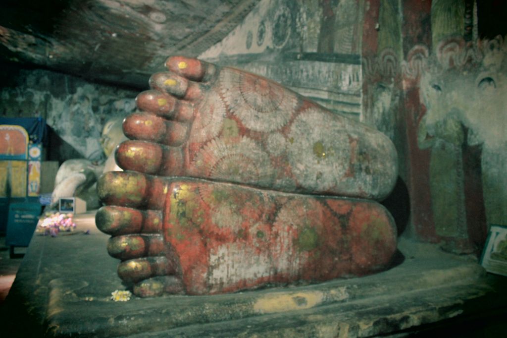 un bouddah mort (ayant atteint le nirvana) comme l'indique le léger décalage de ses pieds